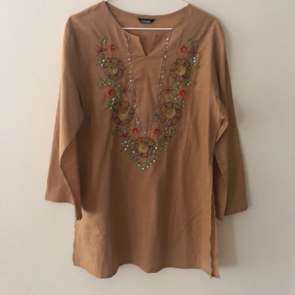 Embellished Indian-inspired shirt with side slits.